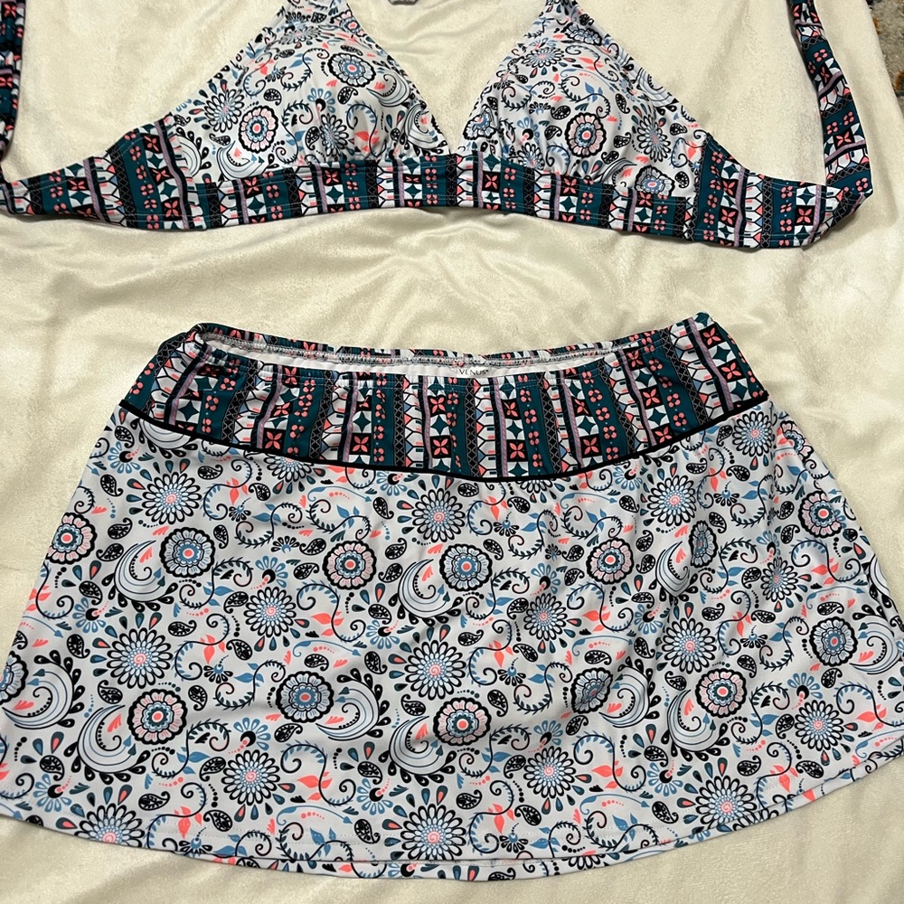 Venus skirted bottom size 12 and halter top size 38C.  Great condition.